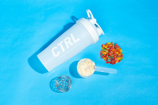 white and green plastic bottle beside clear glass round saucer